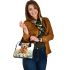 Cute golden retriever with easter eggs and white daisies shoulder handbag