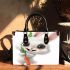 Cute happy white rabbit with big eyes holding one carrot small handbag