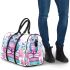 Cute owl sitting on books in pink and blue colors with flowers 3d travel bag