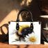 Cute smiling bee sitting on a daisy flower small handbag