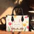 Cute white bunny surrounded by colorful tulips small handbag