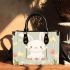 Cute white rabbit sitting on the swing small handbag