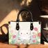 Cute white rabbit sitting on the swing small handbag