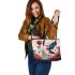 Majestic bird and whimsical balloons in dreamy landscape leather tote bag