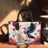 Majestic bird and whimsical balloons in dreamy landscape small handbag