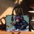 Monkey wearing sunglasses skiing with trumpet small handbag