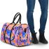 Orange butterfly surrounded by colorful spring flowers 3d travel bag