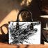 Sea turtle in black and white with a splash water effect small handbag