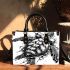 Sea turtle in black and white with a splash water effect small handbag