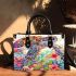 Sea turtle with tropical flowers and leaves small handbag
