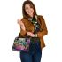 Vibrantly colored psychedelic frog sitting on top of an egg shoulder handbag