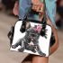 Adorable grey french bulldog puppy wearing pink roses shoulder handbag