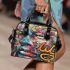 An intricate colorful painting shoulder handbag