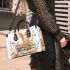 Baby rabbit sitting on top of books surrounded by flowers small handbag