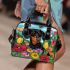 Black and tan dachshund dog surrounded by colorful tulips shoulder handbag