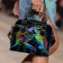 Blacklight poster of two rainbow sea turtles shoulder handbag