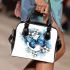 Blue butterfly with white flowers around shoulder handbag