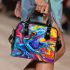 Blue frog with rainbow stripes on his body shoulder handbag