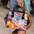 Colored butterfly surrounded by vibrant flowers shoulder handbag