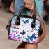 Colorful butterflies with pink and blue wings shoulder handbag