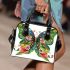 Colorful butterfly with floral designs on its wings shoulder handbag