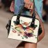 Colorful butterfly with flowers on its wings shoulder handbag
