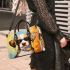 Colorful canine a playful pup in sunglasses small handbag