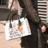 Cute bunny sitting on top of an carrot hello spring small handbag