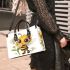 Cute cartoon bee holding flowers small handbag