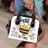 Cute cartoon drawing of a smiling bee doing shoulder handbag
