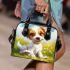 Cute cartoon puppy sitting on the grass shoulder handbag