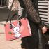 Cute cartoon rabbit playing with a carrot small handbag