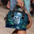 Cute owl with big blue eyes perched shoulder handbag
