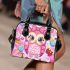 Cute pink owl with a bow on its head surrounded by candy shoulder handbag