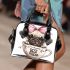 Cute pug puppy with a pink bow on its head shoulder handbag