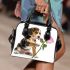 Cute valentine's day beagle puppy holding a pink rose shoulder handbag