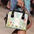 Cute white rabbit sitting on the swing shoulder handbag