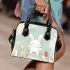 Cute white rabbit sitting on the swing shoulder handbag