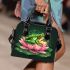 Frog jumping on a pink lotus flower shoulder handbag