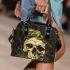 Green frog playing the banjo on top of human skull shoulder handbag