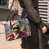 Grinchy with black sunglass and dancing santaclaus small handbag