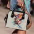 Koi fish with butterfly wings is depicted shoulder handbag