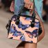 Seamless pattern with a digital illustration of blue butterflies shoulder handbag