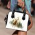 Stag in the forest shoulder handbag