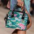 Vibrant pattern of pink and turquoise butterflies shoulder handbag