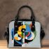 Abstract composition featuring bold shapes shoulder handbag