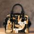 Abstract gold black and white with geometric shapes shoulder handbag