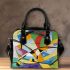 Abstract modern painting of the toucan bird shoulder handbag