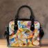 Abstract painting of musical notes and instruments shoulder handbag