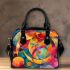 Abstract painting of vibrant colors and shapes shoulder handbag